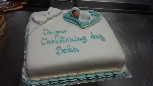 Christening roll icing cake